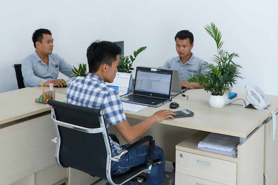 Planter engineers working in the office